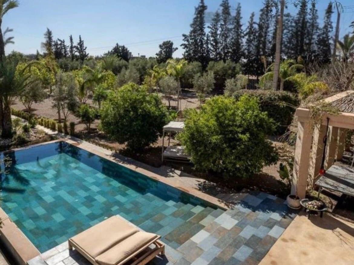 Pool and garden of a short-term rental in Marrakech
